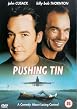 Pushing Tin