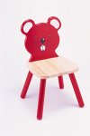 A chair with a mouse's face as the backrest.