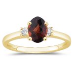 0.10 Cts Diamond & 5.56 Cts Garnet Classic Three Stone Ring in 14K Yellow Gold