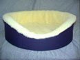 100 Sheepskin Oval Pet Bed Assorted Colors 28 in for Dogs and Cats