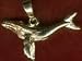 Spirit Stone Silver & Gold Jewelry - Small Whale (14 kt Gold) 2.1 grams Front Label Panel: Spirit Stone Jewelry Small Whale Pendant Instructions: Attach To Necklace Ingredients: 14K Gold 3/4" X 1" Supplemental Facts: Necklace Not Included