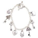 7.5 Silver Metal Charm Toggle Bracelet