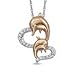 ZALES Diamond Leaping Dolphin Hearts Pendant in 10K Two-Tone Gold 1/10 CT. T.W. dia fash pend/neck