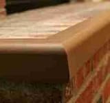 One 8x8 Inch BROWN Hearth Pad Corner