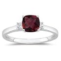 0.10 Cts Diamond & 0.70 Cts Garnet Classic Three Stone Ring in Platinum
