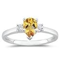 0.10 Cts Diamond & 0.62 Cts Citrine Classic Three Stone Ring in Platinum