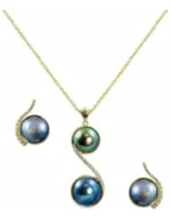 18k 11mm & 13mm double Eyris pearl and diamond (.236ctw) pendant on 18" chain and 18k 12mm Eyris pearl and diamond (.392ctw) earrings.