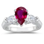 0.20 Cts Diamond & 0.45 Cts Ruby Three Stone Ring in Platinum