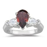0.20 Cts Diamond and 0.80 Cts Garnet Three Stone Ring in 14K White Gold