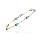 0.07 Cts Diamond & 1.47 Cts Swiss Blue Topaz Bracelet in 14K Two Tone Gold