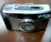 Polaroid PZ2320 AF Power Zoom 35mm Film Camera w/ Auto Focus 38-90mm Power Zoom Camera (Grey Silver Color)