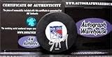 Scott Gomez autographed Hockey Puck (New York Rangers)