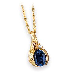 Classy! 10k Yellow-gold Black Hills Gold 1/40 Ct Diamond & 8x6 mm Oval (September-Birthstone) Sapphire pendant-necklace