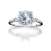 0.70 Carat F/SI1 Round Diamond Engagement Ring with Round Side Stones in Platinum