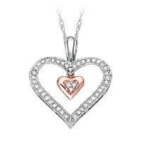 10kt. Two Tone, 1 6 ct. tw. Diamond Heart Pendant by Fred Meyer Jewelers