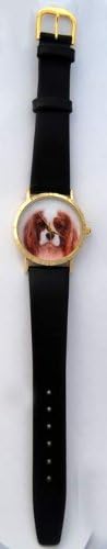 Cavalier King Charles Spaniel watch classic size 1.1/4 inch dial. Gold tone case Black leather band.