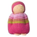 Click here to buy Fair Trade Cuddling Doll - Pink Outift by Peppa.