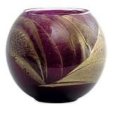 AMETHYST CANDLE GLOBE by AMETHYST CANDLE GLOBE THE INSIDE OF THIS 4 inch POLISHED GLOBE IS PAINTED WITH WAX TO CREATE SWIRLS OF GOLD AND RICH HUES AND COMES IN A SATIN COVERED GIFT BOX. CANDLE IS FILLED WITH A TRANSLUCENT WAX AND SCENTED WITH MYSTERIA. BU
