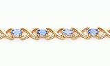 4.50ct total weight oval shape blue topaz 7 bracelet set in 14kt gold.