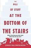 The pile of stuff at the bottom of the stairs