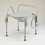 Commode- Arms drop independently Snap on toilet seat. Capacity 300 pounds
