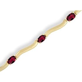 14K Yellow Gold Oval Created Ruby Bracelet by Jewels For Me