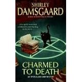 Charmed to Death: An Ophelia and Abby Mystery (Ophelia and Abby Mysteries)von "Shirley Damsgaard"