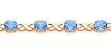 16.0ct total weight oval shape blue topaz 7 bracelet set in 14kt gold.