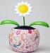 Solar powered Hello Kitty tattoo flower pot with swaying sunflower.