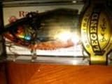 Rat-l-trap 1/2 Oz Shad Color: Gold Orange Craw