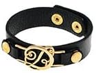 7" - 7 1/2" Black Tone 3/4" Wide Faux Leather Bracelet Featuring a Gold Tone "D" Initial.