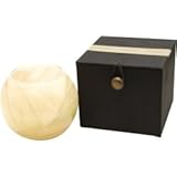 IVORY CANDLE GLOBE by IVORY CANDLE GLOBE The Inside Of This 4 In Polished Globe Is Painted With Wax To Create Swirls Of Gold And Rich Hues And Comes In A Satin Covered Gift Box. Candle Is Filled With A Translucent Wax And Scented With Mysteria. Burns Approx. 50 Hrs