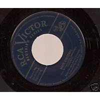 Click here to buy White Christmas She Wore A Yellow Ribbon by  Ralph Flanagan .