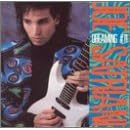 Click here to buy Dreaming #11 by Joe Satriani .