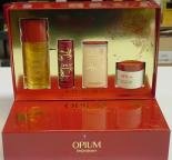 Opium by Yves Saint Laurent for Women - 4 Pc Gift Set 1.6oz EDT Spray, 1.6oz Rich Body Cream, 1.6oz Luscious Shower Gel, 0.7oz Satin Dusting Powder