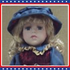 Pretty New Porcelain Doll in Blue Dress With Pink Bow