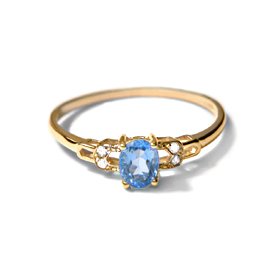 .02CT Round Diamond and Oval Blue Topaz Ring