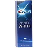 Crest Vivid White Flouride Toothpaste, Refreshing Mint - 4.10 Oz