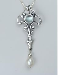 A Sweet Sterling Silver Necklace Accented with Genuine Blue Topaz