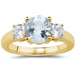 0.20 Cts Diamond & 0.52 Cts Sky Blue Topaz Three Stone Ring in 14K Yellow Gold