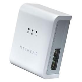 NETGEAR 85 Mbps Wall-Plugged Ethernet Switch XE104 - Bridge - 4-port switch - HomePlug 1.0 - wall-pluggable