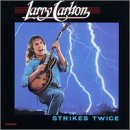 Click here to buy Strikes Twice by  Larry Carlton .