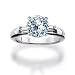 0.70 Carat D/SI1 Round Diamond Three Stone Engagement Ring with RB Side Stones in Platinum