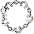 Silver-tone Bracelet with Horseshoes with Blue Stones
