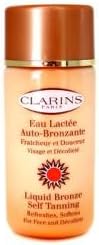 Clarins by Clarins Liquid Bronze Self Tanning ( Face & Decollete )--125ml/4.2oz