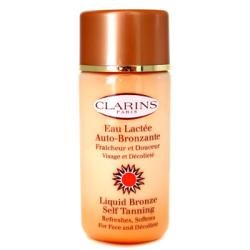 Clarins by Clarins Liquid Bronze Self Tanning ( Face & Decollete )--125ml/4.2oz