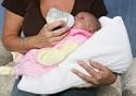 AR Pillow Snuggle Nurser - Comfortably Hold your Baby while feeding - Pillow Angle Minimizes Spitting-up and Reflux while providing comfort for Baby (AND Mom's arms!)
