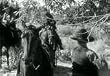 Alias John Law (1935)-The ringleader of a gang impersonates a deputy in order to steal land.