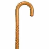 Carved wood Cane - Natural Stain color. This traditional walking cane can be used in either right or left hand. This cane is also known as hospital cane. It is made in solid wood, weight capacity 250 pounds, height 36-37 inches.