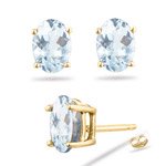 6x4 mm Oval Aquamarine Stud Earrings in 18K Yellow Gold